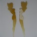 two Bakelite Betty Grable swizzle sticks