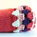 Coral Knitted Baby Blanket With Granny Square Trim