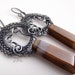 On Sale Sterling Silver Wire Wrapped Dangle Earring With Elongated Warm Brown And Gray Tiger's Eye Drops.