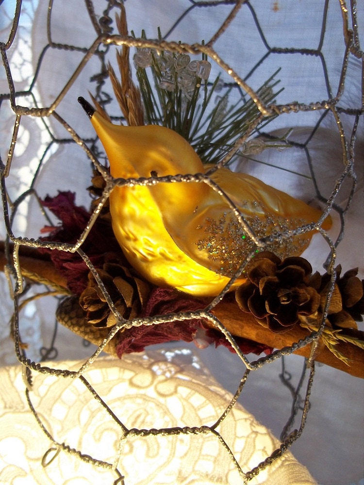 christmas ornament chicken wire birdcage with golden glass christmas ornament chicken wire birdcage with golden glass