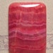 Rhodochrosite cab.......... 47 x 32 x 6.5 mm thick ...... 2730