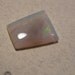 Australian Opal cab ... 8 x 7 x 2mm thick . a4752