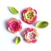 Crochet pink flowers applique, embellishments, scrapbooking with green leaves decorations
