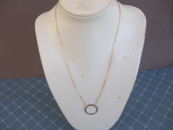 Hammered gold hoop necklace. by oliveliDesign on Etsy