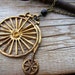Steampunk Necklace Whimsical Penny Farthing Bicycle Necklace with Black Accent Long Chain Necklace Handmade by Compass Rose Design