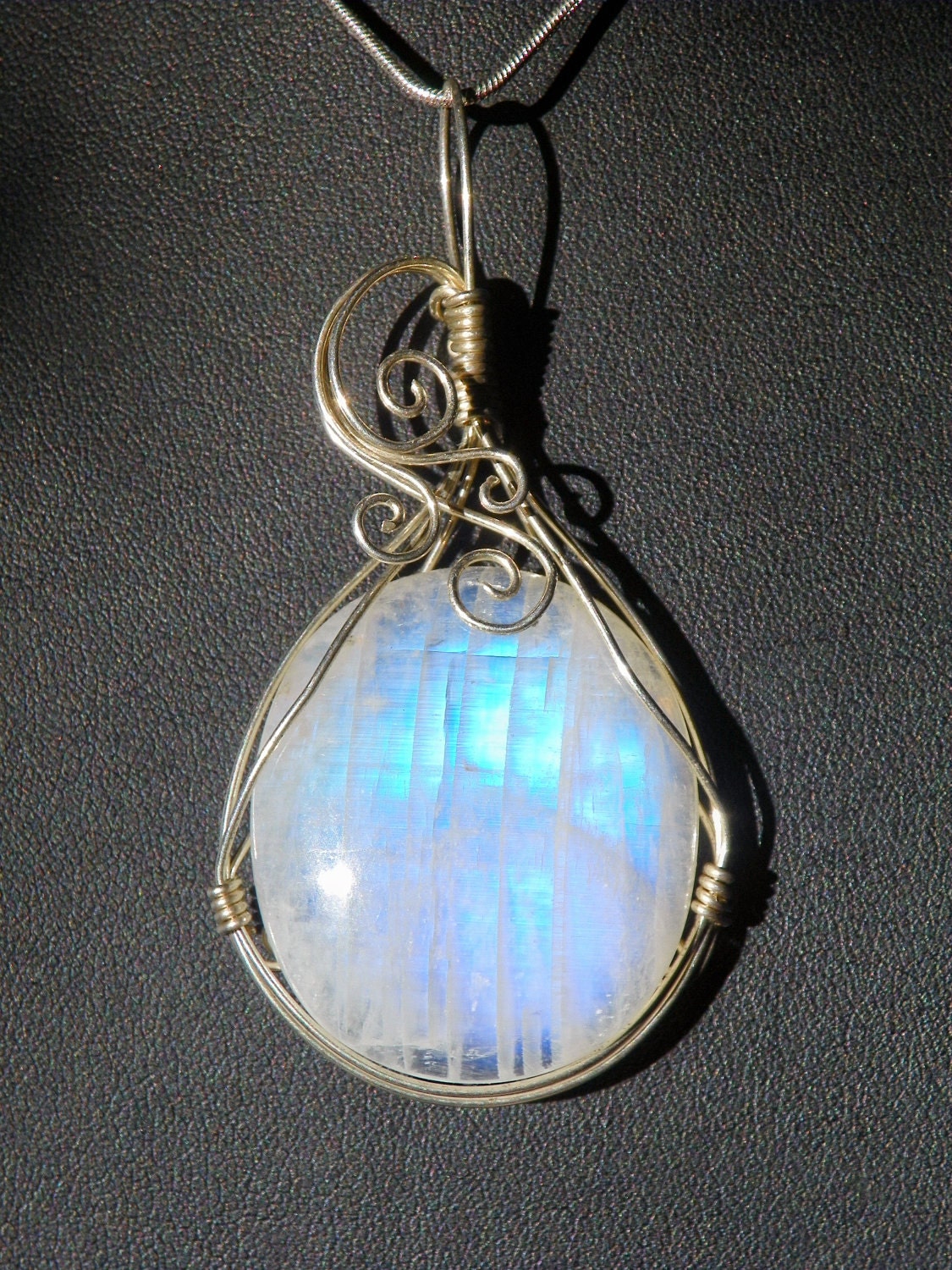 Moonstone in sterling silver wire wrapped pendant necklace..