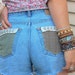 Reserved,Sale, shredded vintage high waisted SHORTS, boho, feather applique, crochet lace trim faded denim, gap brand, size 8, by Zasra