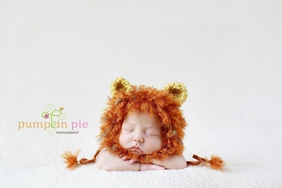 Specialty Gear This baby lion hat makes for the sweetest newborn baby gift. Newborn baby photos look adorable when your baby boy or girl wears this hand crocheted lion hat. This precious little crocheted lion hat makes a darling upscale unisex baby gift.