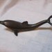 vintage dolphin bottle opener