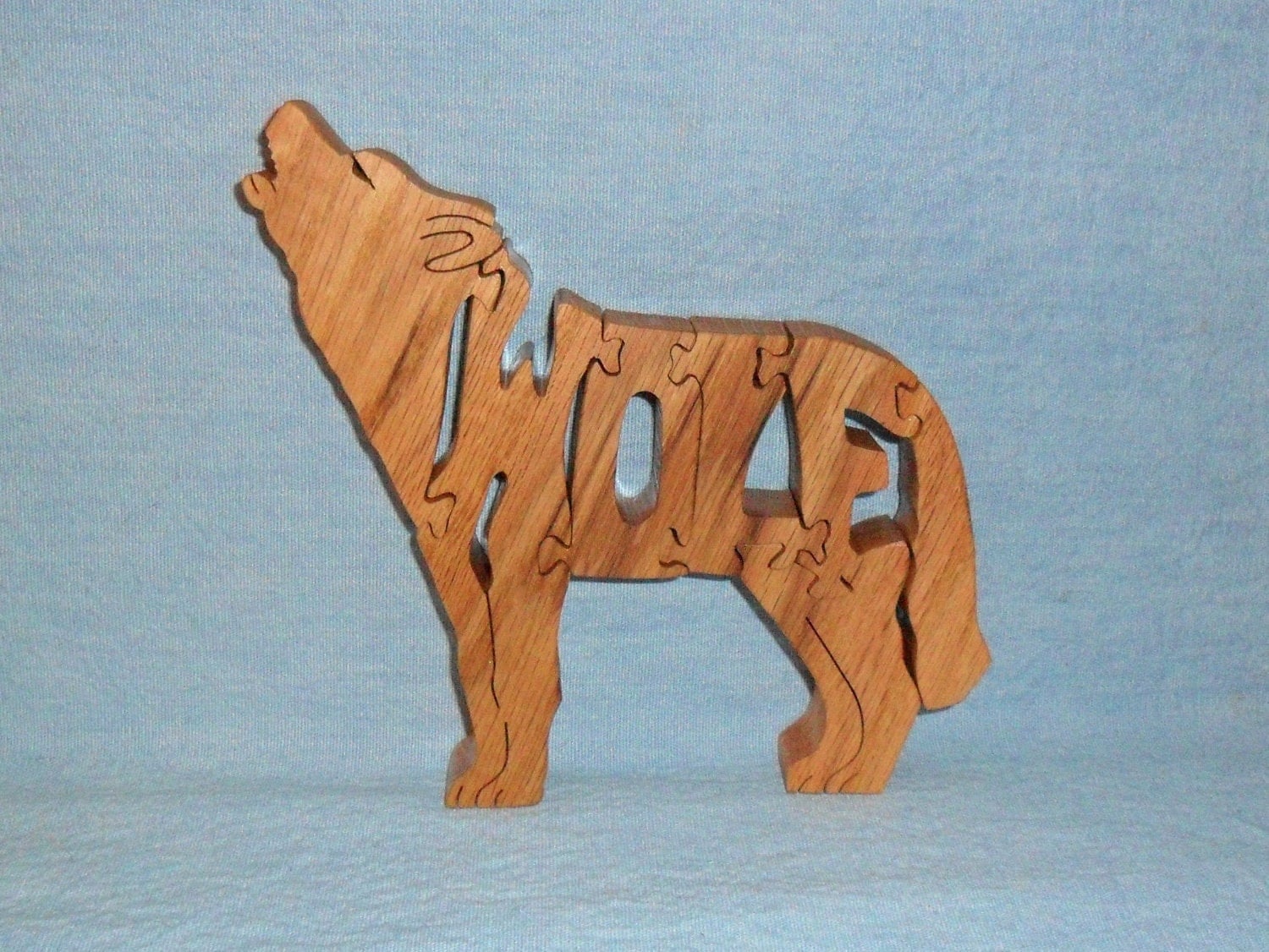 Saw puzzle. Wolf Wooden Puzzle.