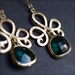 Bohemian Glamour-Eclectic Golden Pendant with Emerald Blue Sea Glass