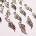 Angel wings Silver color charms beads hypoallergenic 40 pcs