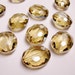 Crystal faceted focal beads oval 6 pcs 24mm by 19mm AA quality light topaz