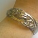 Chrome Art Deco Bangle... Unusual Flower pattern