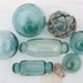 Japanese Glass Fishing Floats - Collection of 7 in Shades of Green and Teal Blue