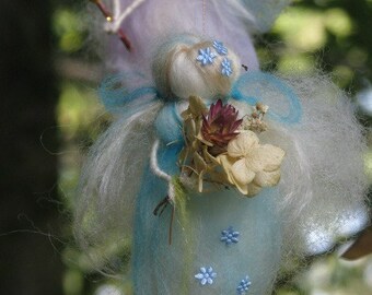 A charming needle felted mobile with angels