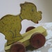 Vintage Wood Pull Toy Dog 1950s Yellow Red Blue Rustic Primitive Folk Art