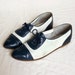 Vintage oxfords 8.5. Navy & white perforated leather oxford flats.