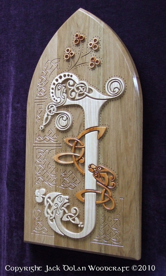 Items similar to Book of Kells in Wood wall hanging 