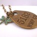 Brass dragonfly necklace - vintage style verdigris patina insect charm and numbered key tag on decorative bronze chain