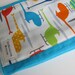 Turquoise Hand Dyed Mini Burp Cloth with Organic Cotton Ready, Set, Go Helicopters Fabric