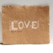 Typography Art love print - LOVE in White Linoprint 8x10 on Brown Recycled Cerealbox Paper