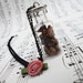 Romantic mini bottle necklace with dried thorns and fabric rose by Dryw on Etsy