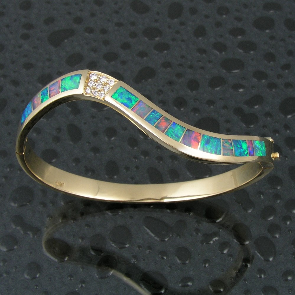 Australian opal bracelet with diamonds in 14k gold