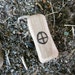 Carved oak solar cross pendant