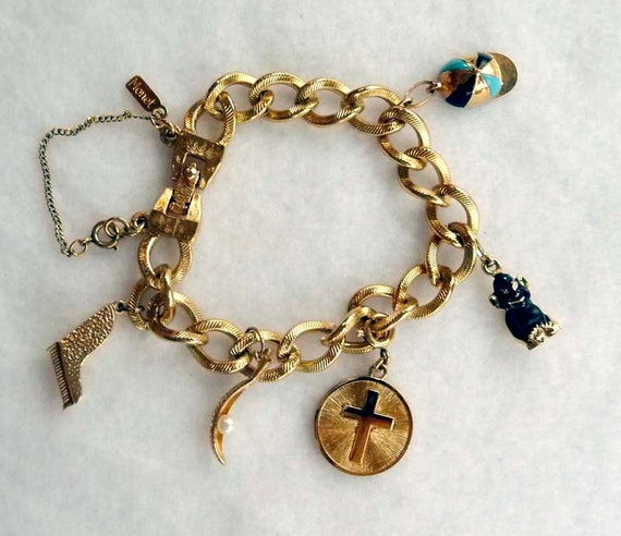 Vintage Monet Charm Bracelet Piano Hat Cross by thejewelseeker