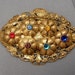 Art Nouveau Oval Brooch with Multi Colored Rhinestones