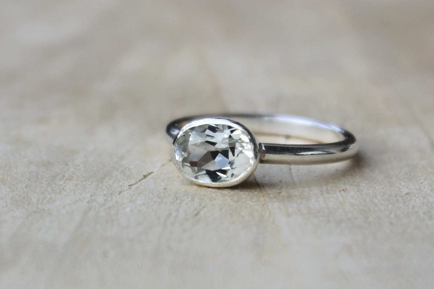 Oval engagement rings set sideways