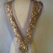 Big beaded peace of applique with gold sequence