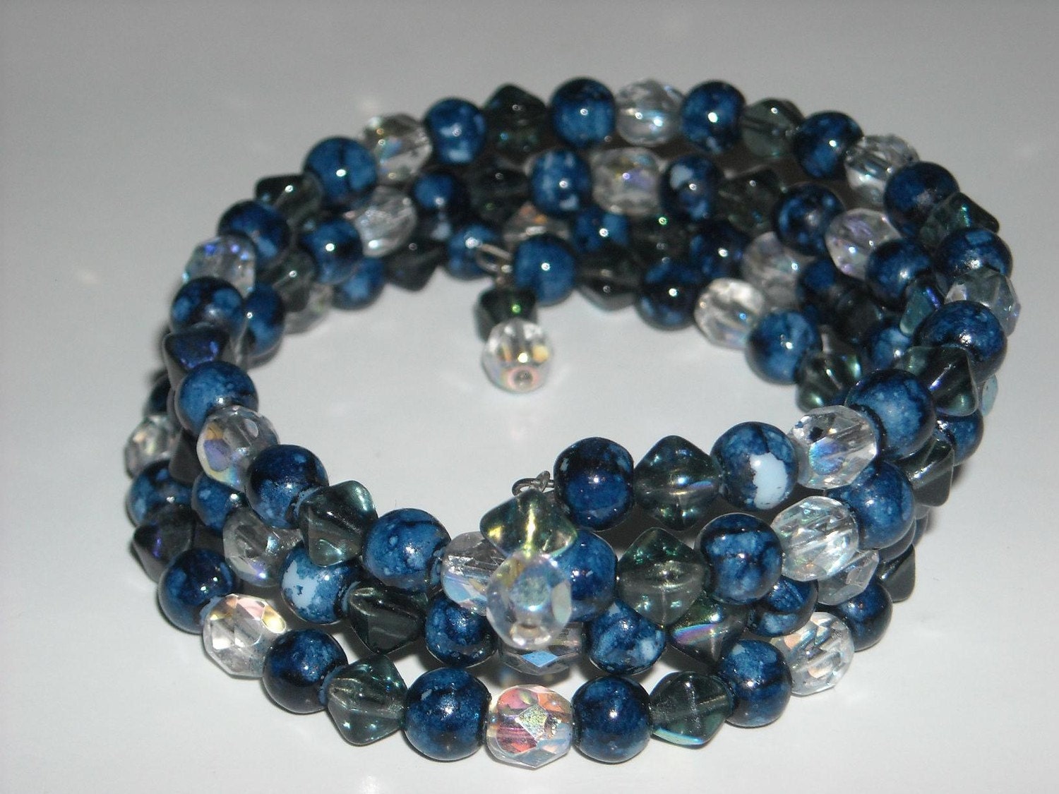 Blue Marble And Fire Polished Glass Bead Memory Wire Bracelet