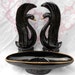 Mid Century t.v. decor set, black swan figures with artificial flower planter, black and gold accents redware for your retro decor