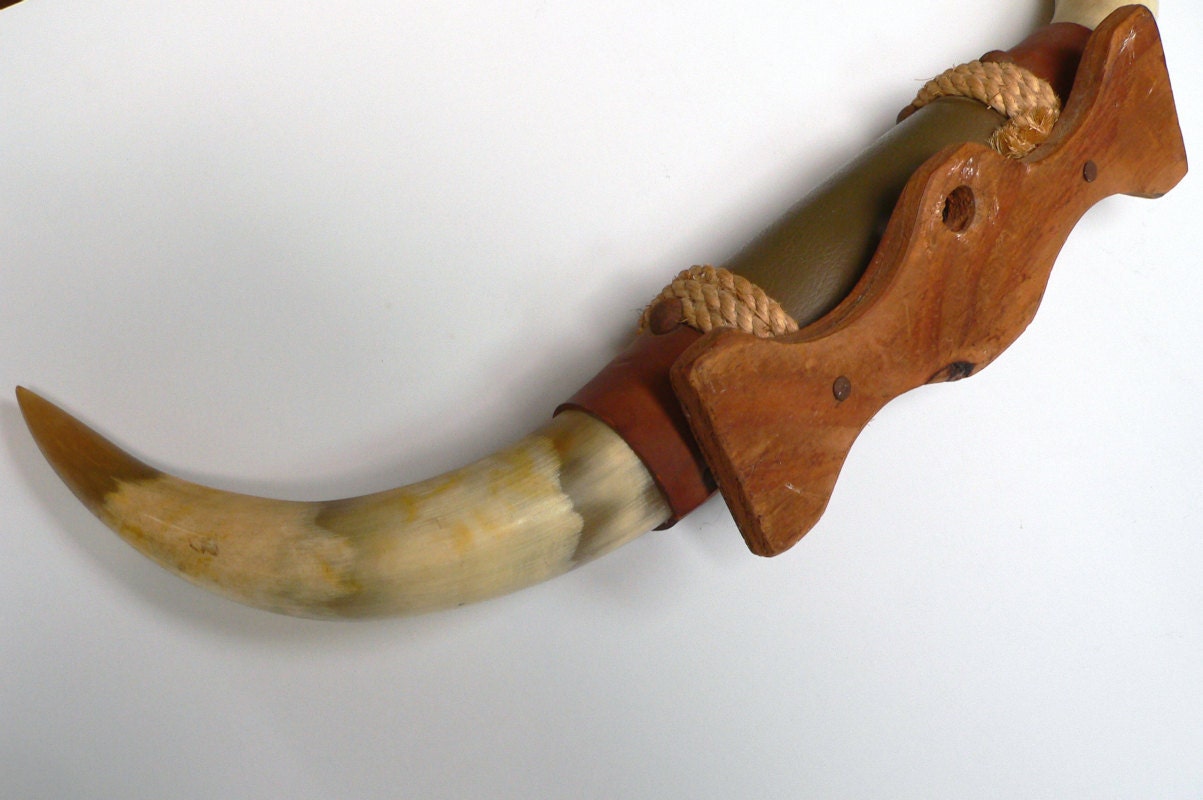 Vintage steer bull horns leather and rope trim mounted on wood