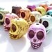 Cotton candy colored gemstone skull beads (four beads)