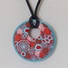Millefiori pendant necklace in red, orange, turquoise and white, polymer clay