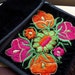 TEN DOLLAR SALE... Vintage black velour bag with luminous floral embroidery and tassel details