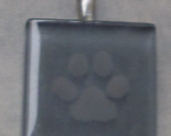 Etched glass stormy gray paw print pendant