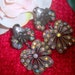 Large Aurora Borealis Dangle Bow Earrings