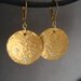 Gold disc earrings with hand set cubic zirconia