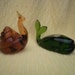 Vintage - Pilgrim Green Glass Whale and Amber Snail Paperweights