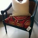 The Molly Chair Teal Green and Gold Vintage Cane Chair with Ikat Fabric Seat.