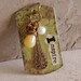 Inspire mixed media dog tag pendant with Vintaj brass filigree, yellow opal, pearl, crystal