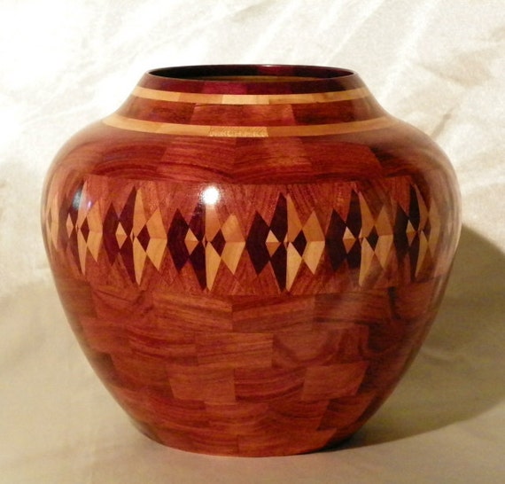 Beautiful segmented turned urn by passionsinwood on Etsy