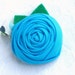 Rosette clip in peacock blue