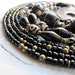 RESERVED- Asymmetrical Tribal Bib Necklace: BeadedStrand, Ebony Wood Dalmatian Jasper Glass Evil Eye Beads