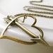 Cupid's Arrow Necklace. Antiqued Brass Lariat. Doubles as a bracelet. Shot through the heart.