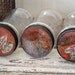 3 old Folgers Coffee jars with Red Lids